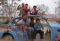 Ori with kids in Eco Kef